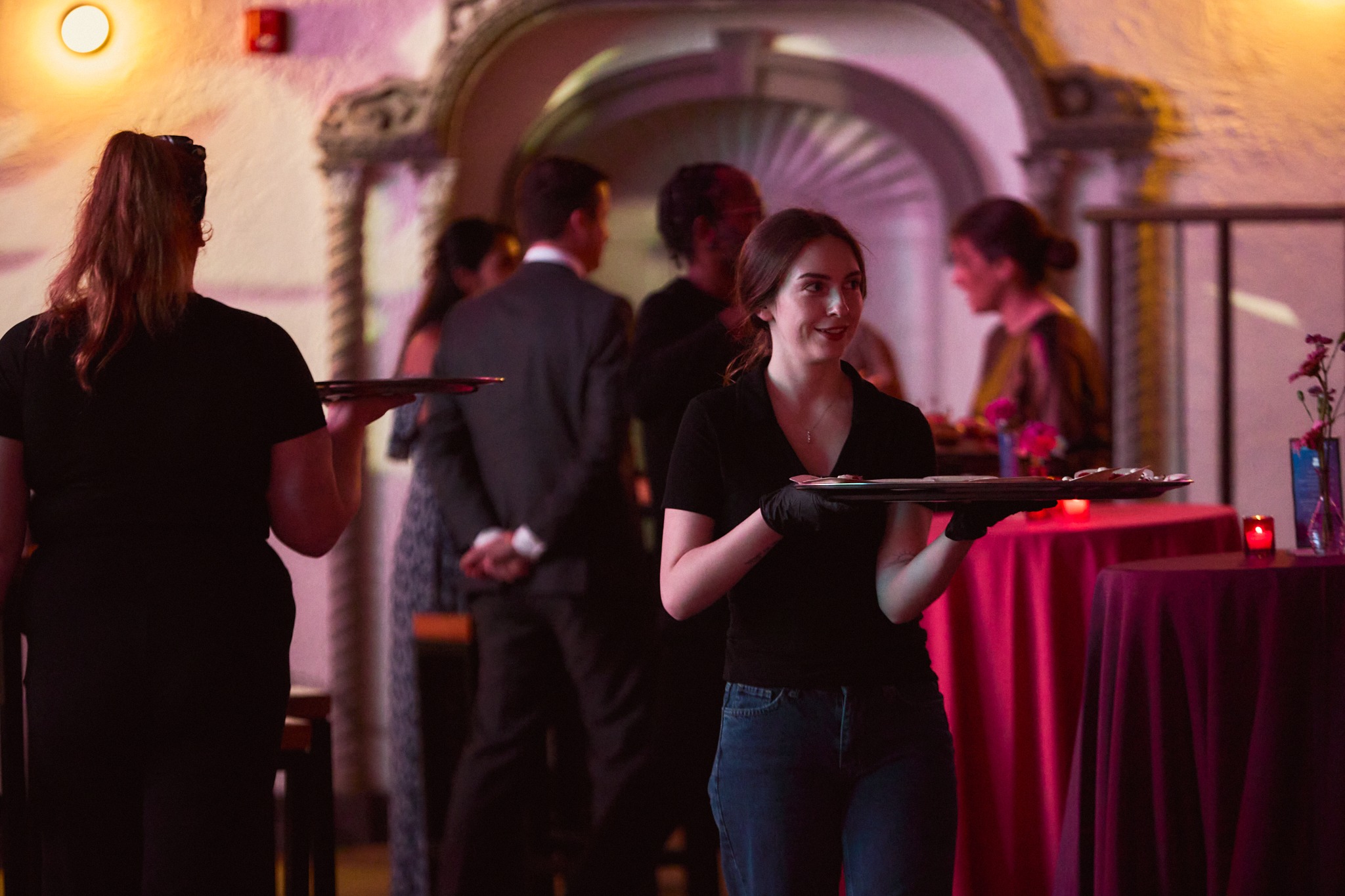Event service team circulating hors d'oeuvres during a reception