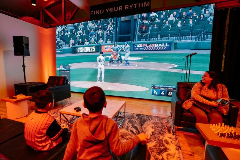 Guests watching a large-format video wall at a venue event